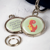 prehistoric pup dog tag - red dino