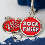sock thief dog tag